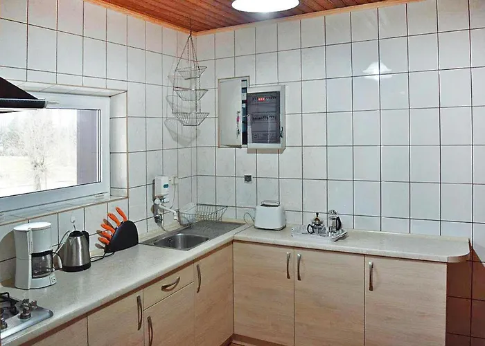 With Thatched Roof, Rekowo